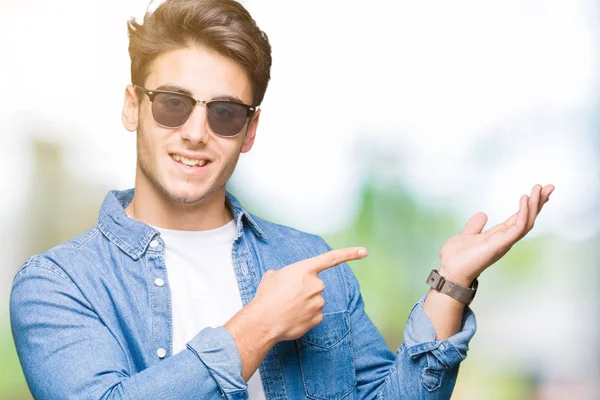 depositphotos 249887772 stock photo young handsome man wearing sunglasses